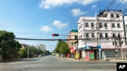 FILE - An empty street in Mandalay, central Myanmar, Dec. 10, 2021. Soe Naing, a local freelance photographer in Myanmar, died in military custody after being arrested last week during the course of his work, colleagues and a friend of his family said Dec. 14, 2021. 