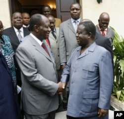 Alassane Ouattara (à gauche) et Henri Konan Bédié