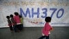 Malaysian PM Says Someone on Missing Plane Turned Off Communications