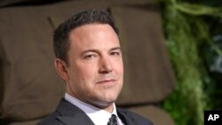 FILE - Actor Ben Affleck at the world premiere of "Triple Frontier" at Jazz at Lincoln Center in New York, March 3, 2019. From Ben Affleck and Susan Sarandon to Anna Wintour and Willie Nelson, celebrities lined up to give money to their favorite Democratic presidential candidates