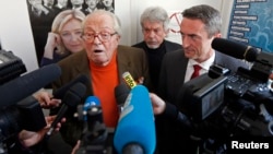 FILE - France's far-right National Front political party founder Jean-Marie Le Pen speaks to journalists at a news conference in Marseille, March 27, 2014.