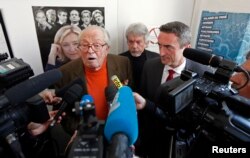 FILE - France's far-right National Front political party founder Jean-Marie Le Pen speaks to journalists at a news conference in Marseille March 27, 2014.