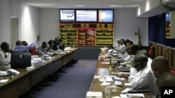 FILE: In this April 24, 2008 file photo, trading gets underway on the Zimbabwe Stock Exchange in Harare.