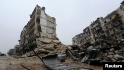 A general view shows the damage in the government-held al-Shaar neighborhood of Aleppo, Syria, during a media tour, Dec. 13, 2016.