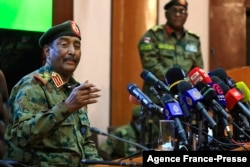 FILE - Sudan's General Abdel Fattah al-Burhan speaks during a press conference at the General Command of the Armed Forces in Khartoum, Oct. 26, 2021.