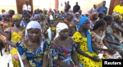 ຮູບພາບພວກແມ່ຍິງ ທີ່ເຜີຍແຜ່ໂດຍ ພວກຫົວຮຸນແຮງ Boko Haram ທີ່ພາກເໜືອຂອງ ໄນຈີເຣຍ ທີ່ເມືອງ Chibok.