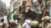 Police Kill 2 Burqa-Clad Militants in NW Pakistan