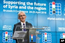 FILE - U.N. Undersecretary-General for Humanitarian Affairs and Emergency Relief Coordinator Mark Lowcock addresses the media during a conference on Syria at an EU Council in Brussels, April 25, 2018.