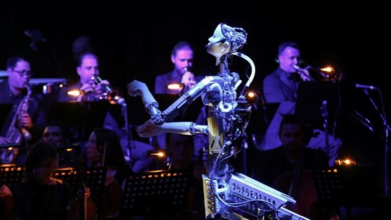 Robot Leads Human Musicians in Orchestra Performance