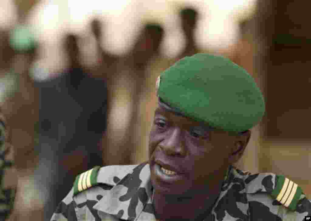 Coup leader Capt. Amadou Haya Sanogo addresses the press at junta headquarters in Kati, outside Bamako, Mali Friday, March 30, 2012.