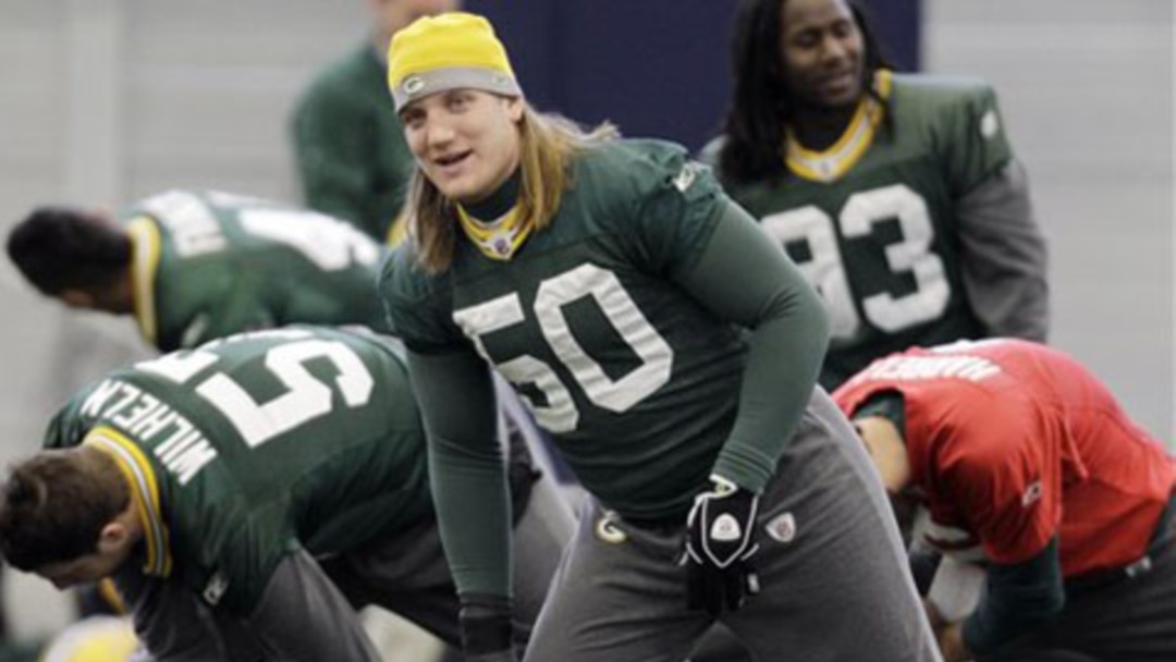 Green Bay Packers linebacker A.J. Hawk wears a Cheesehead hat during  Media Day for Super Bowl XLV in Arlington, Texas on February 1, 2011. The  Pittsburgh Steelers will take on the Green