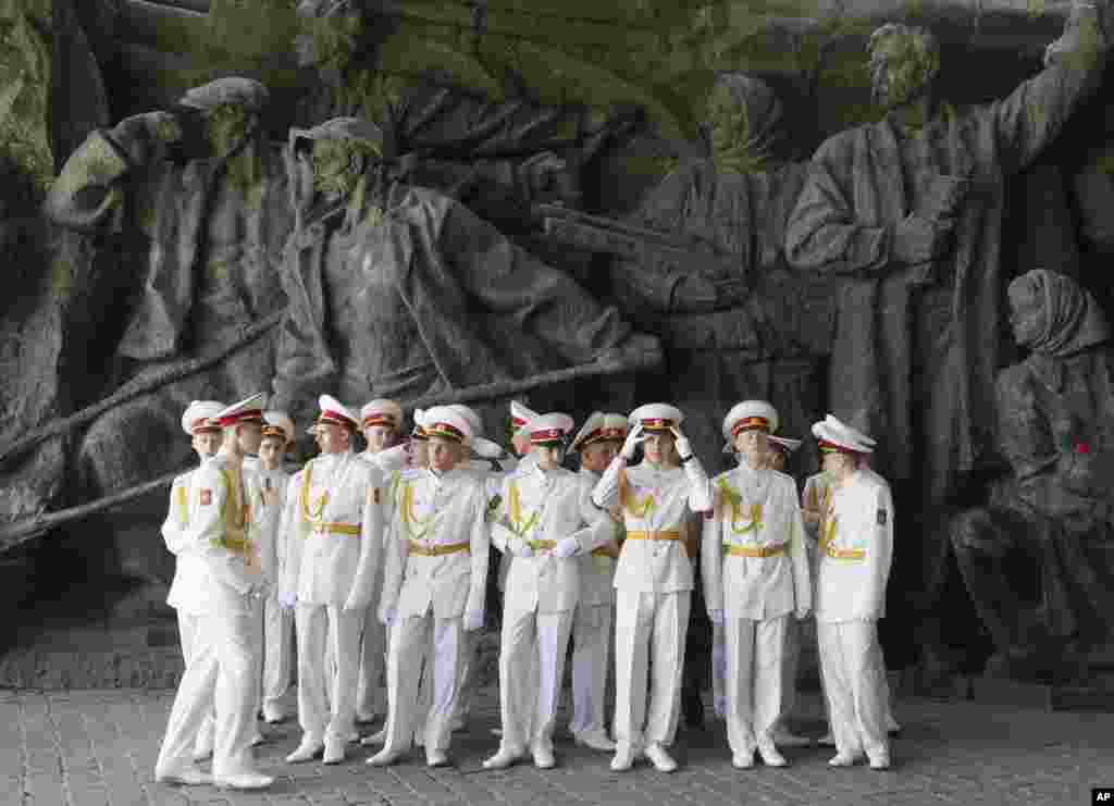 Cadets of the Ukrainian Military academy preparing to celebrate the anniversary of victory over the Nazis at a memorial to World War II veterans in a memorial park in Kyiv, Ukraine.