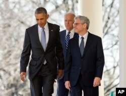 Merrick Garland walks out of White House with President Barack Obama and Vice President Joe Biden after he was introduced as Obama's Supreme Court nominee in 2016.