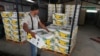 FILE — A worker stacks boxes of bananas for export in Ciudad Hidalgo, Chiapas state, Mexico, May 31, 2019. Data released by the U.S. Commerce Department this week show that goods imported from Mexico accounted for 15% of U.S. imports in the first 11 months of 2023.