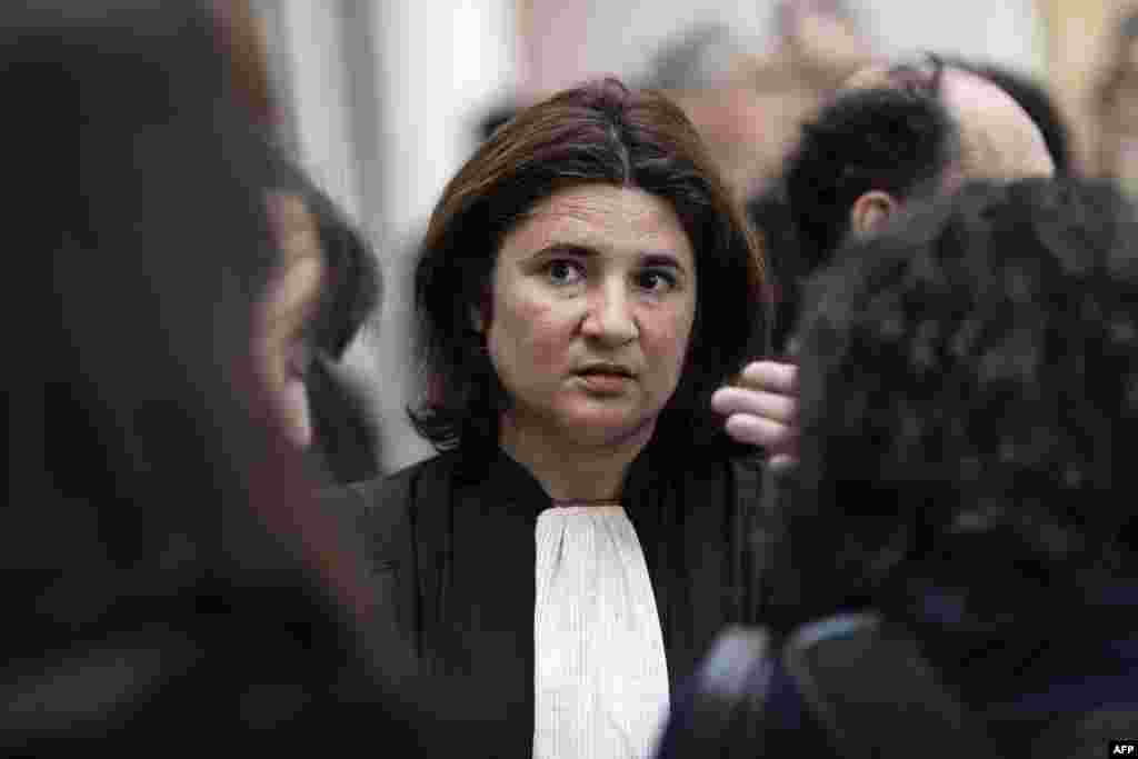 French lawyer Anna Salabi takes part in a demonstration at the Paris courthouse to protest against her eviction from a courtroom.