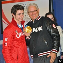 From left: Scott Moir, British Columbia Premier Gordon Campbell and Tessa Virtue