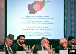 Participants attend the opening of two-day talks between Taliban and Afghan opposition representatives, at the President Hotel in Moscow, Russia, Feb. 5, 2019.