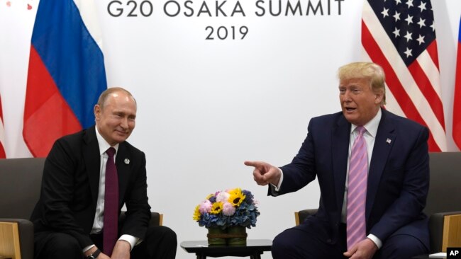 2019年6月28日特朗普(右)在大阪20国集团峰会期间会见普京。