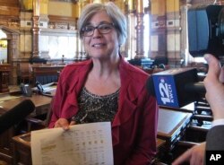 Kansas Senate President Susan Wagle, R-Wichita, answers questions from reporters following the Senate's approval of an education funding plan, April 5, 2018, at the Statehouse in Topeka, Kan.