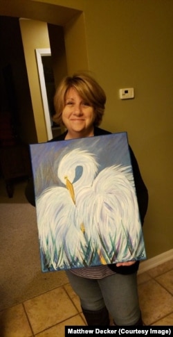 Mom painted a picture of an egret