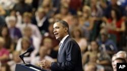 President Barack Obama delivers the commencement address to graduates of Joplin High School in Joplin, Missouri, May 21, 2012.