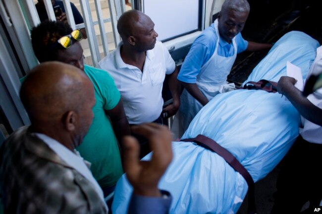 The body of Haiti's late former President Rene Preval arrives to the Sainte Claire hospital in Petion-Ville, Haiti, March 3, 2017.