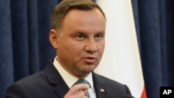 Polish President Andrzej Duda makes a statement in Warsaw, Poland, July 24, 2017. Duda announced that he will veto two contentious bills widely seen as assaults on the independence of the judicial system.