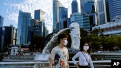 Singapore has been praised for its efforts to limit the spread of the new coronavirus. The city-state has had few cases of COVID-19. But measures that work in rich Singapore might not work in other places.