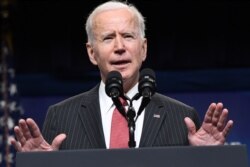 US President Joe Biden speaks about the situation in Myanmar in the South Court Auditorium of the Eisenhower Executive Office Building in Washington, DC, February 10, 2021. (Photo by SAUL LOEB / AFP)