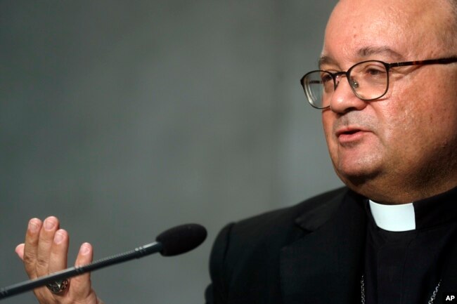 FILE - Archbishop Charles Scicluna speaks during a press conference at the Vatican, Oct. 8, 2018.