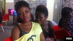 Masia Haliki, 23, left and Vida Sunkari, 26, right, at the food court of the Accra Mall, July 5, 2012. (Laura Burke/VOA)