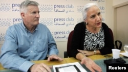 Debra, right, and Marc Tice, parents of Austin Tice, a journalist who has been missing in Syria since August this year, answer questions from journalists at the Press Club in Beirut, November 12, 2012.