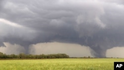 Two tornadoes move toward Pilger, Nebraska June 16, 2014. 