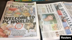 A newspaper stand displays the Herald Sun newspaper, featuring a controversial cartoon of Serena Williams, in Melbourne, Sept. 12, 2018. 