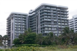 Champlain Towers North North was built in 1982, one year after South, by the same company, using the same materials and a similar design. Just one block away, the nearly 40-year-old building has also faced the same seawater and salty air as South. (AP Photo)