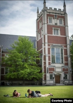 Students relax outside at Bowdoin College.