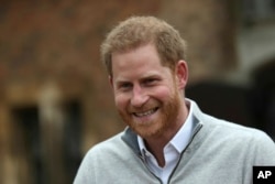 Britain Royal Baby. Britain's Prince Harry speaks at Windsor Castle, Windsor, England, Monday May 6, 2019