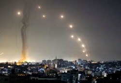 Rockets are launched towards Israel from Gaza City, controlled by the Palestinian Hamas movement, on May 11, 2021. (Photo by MAHMUD HAMS / AFP)
