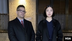 A Thai student, Bew Jirajariyawetch (R), and her attorney, Eric Parnes (L) speak out with VOA Thai following the attack at the Herald Square subway platform.