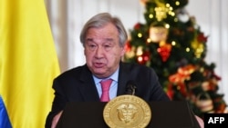 FILE - U.N. Secretary-General Antonio Guterres talks to the media during a press conference at Nariño presidential palace in Bogota, Nov. 24, 2021.