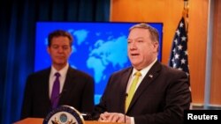 U.S. Secretary of State Mike Pompeo and Ambassador-at-Large for International Religious Freedom, Sam Brownback, releases and comments on the department's annual report on religious freedom around the world in Washington, U.S., May 29, 2018. REUTERS/