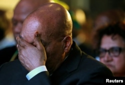 FILE - South Africa's President Jacob Zuma reacts during the official announcement of the munincipal election results at the result center in Pretoria, South Africa, Aug. 6, 2016.