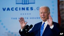 President Joe Biden speaks about COVID-19 vaccinations after touring a Clayco Corporation construction site for a Microsoft data center in Elk Grove Village, Ill., Oct. 7, 2021. 