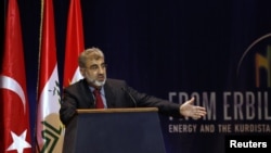 Turkish Energy Minister Taner Yildiz speaks during the first International Energy Arena in Arbil, about 350 kilometers north of Baghdad, Iraq, May 20, 2012.