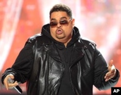 Rapper Heavy D, also known as Dwight Arrington Myers, performs during the BET Hip Hop Awards in Atlanta, October 1, 2011