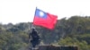 File-On January 19, 2021, soldiers are raising the Taiwanese flag during a military exercise aimed at repelling an attack from China in Hsinchu County, northern Taiwan. 