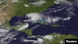 Tropical Storm Debby is pictured in the Gulf of Mexico this June 24, 2012