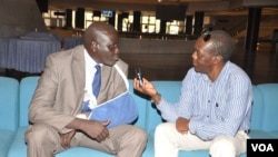 Aggrey Idris (arm in sling), interviewed by VOA's John Tanza Addis Ababa in 2015. (Photo: South Sudan in Focus)