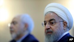 伊朗总统鲁哈尼2018年7月22日出席一场活动（美联社）