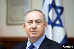 Israeli Prime Minister Benjamin Netanyahu attends the weekly cabinet meeting at his Jerusalem office, Dec. 25, 2016.